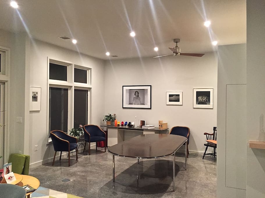 L-shaped living room. Provides additional space for work area, secondary dining/appetizers.