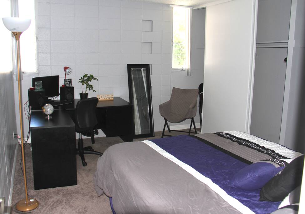 queen size bed and work space