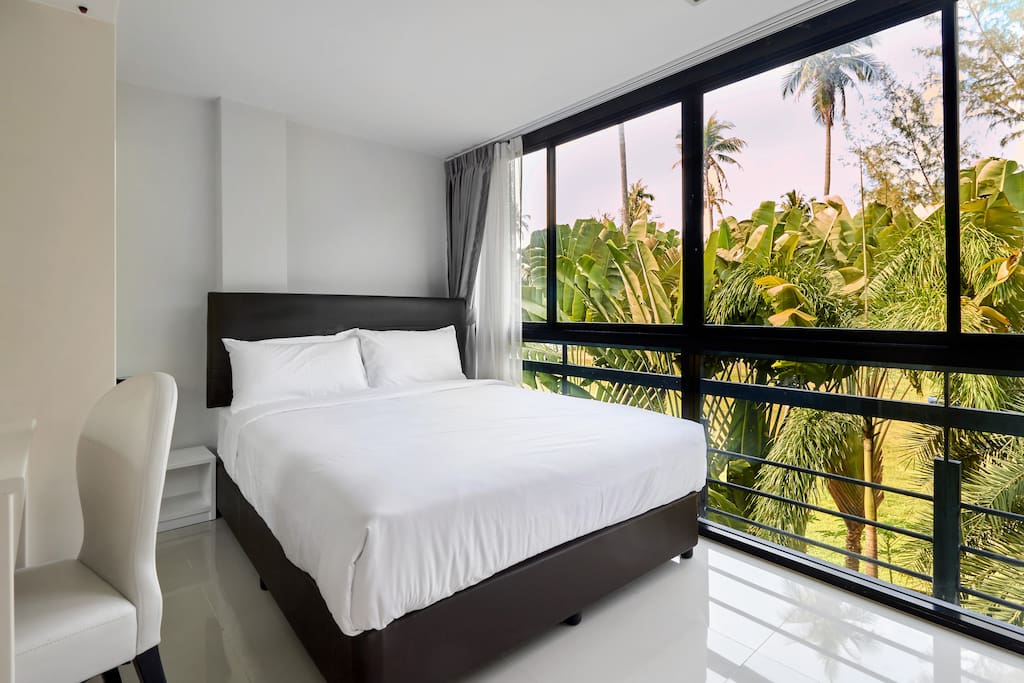 Second bedroom with window view