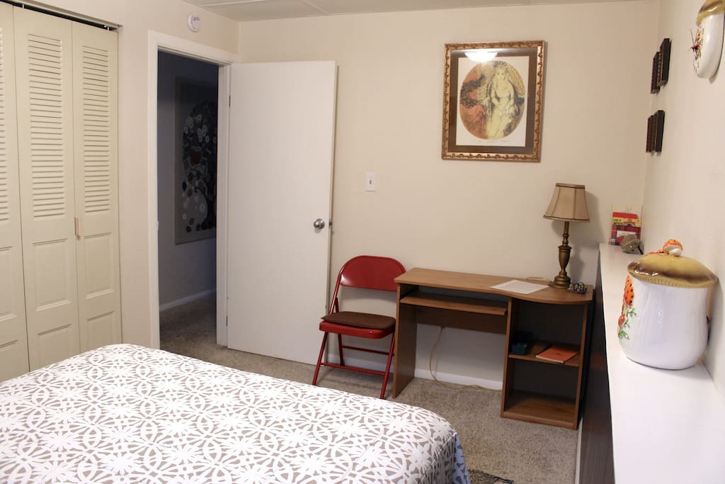 Cozy, private downstairs bedroom with double bed. Head right out your door for your private bathroom.