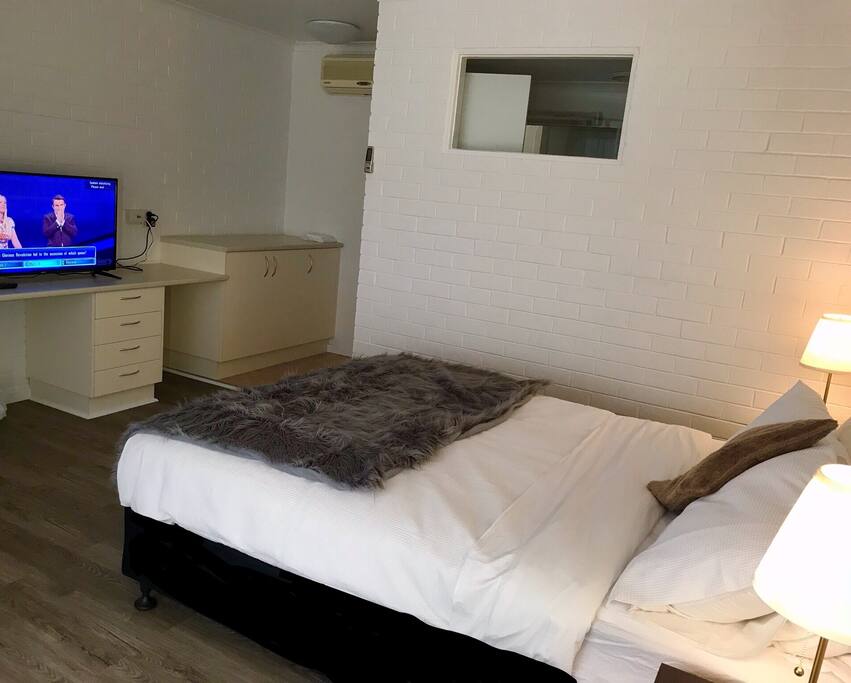 Fully equipped bedroom with Tv, inbuilt cupboards , study,lounge n bathroom .