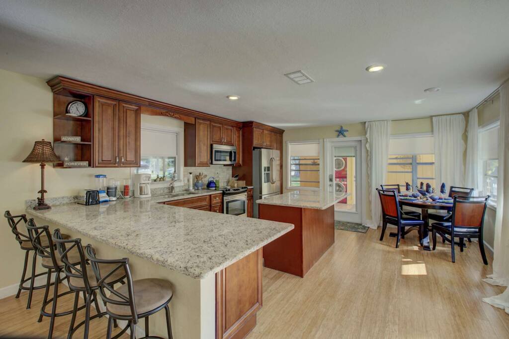 There is a large, beautifully update kitchen with breakfast nook for 4 as well as dining space for 4 people.