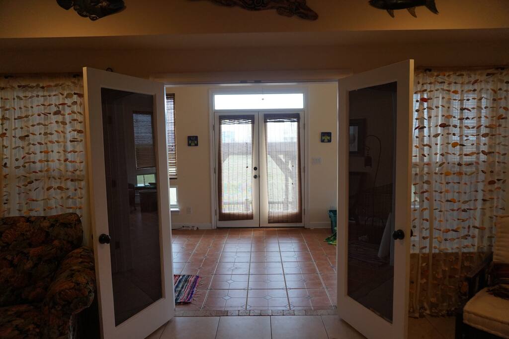 Entrance to first floor indoor sunroom