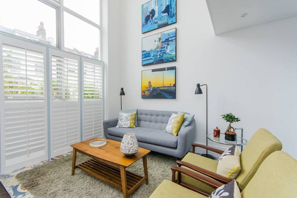 Living Room has 4 meter tall ceilings and flooded with natural light.