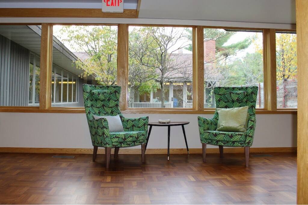 Walls of windows look out on private gardens