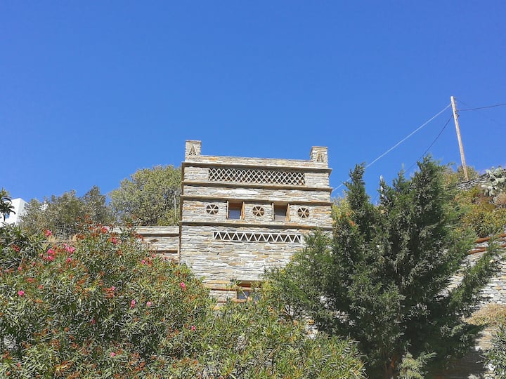 Two-level traditional stone cottage