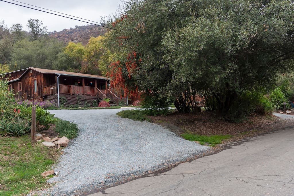 Front of house, across from which the path down to the river is located