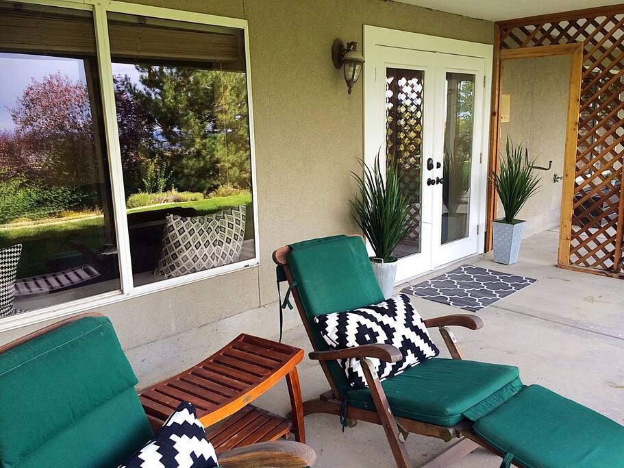 Private entrance off backyard with a brand new staircase from parking area. Cozy loungers and BBQ included in your getaway home.