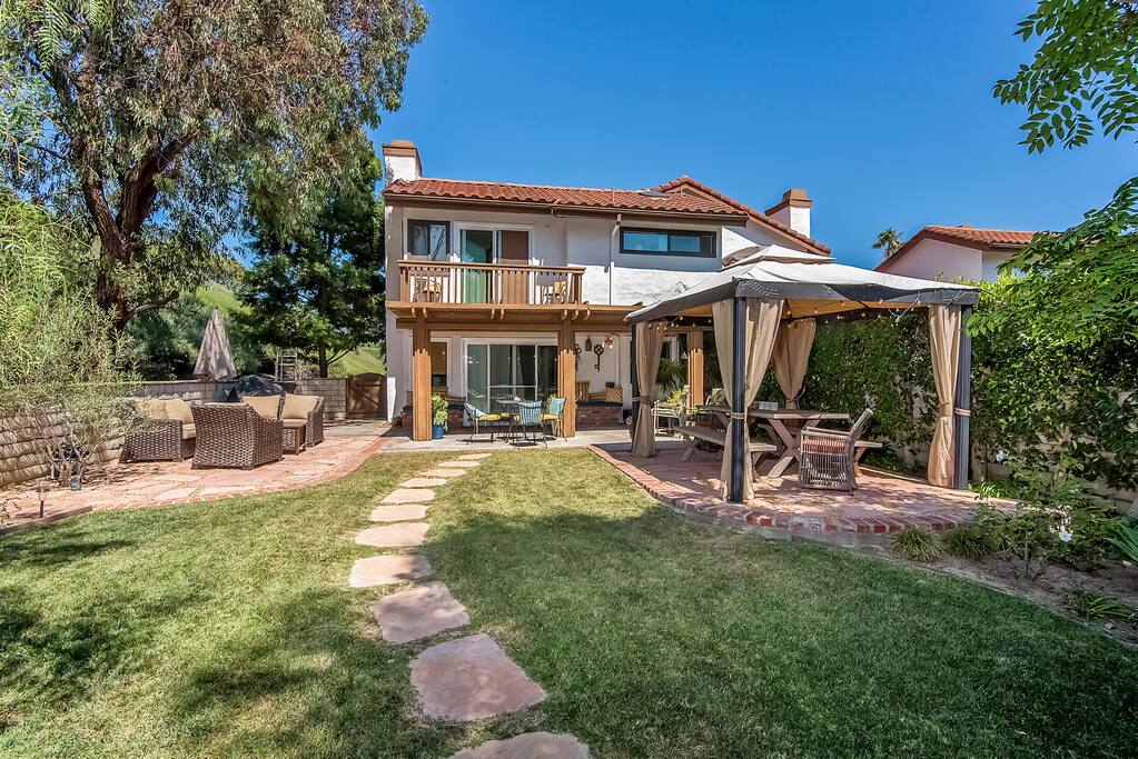 You'll love the spacious backyard and patio at this family friendly San Clemente vacation rental.
