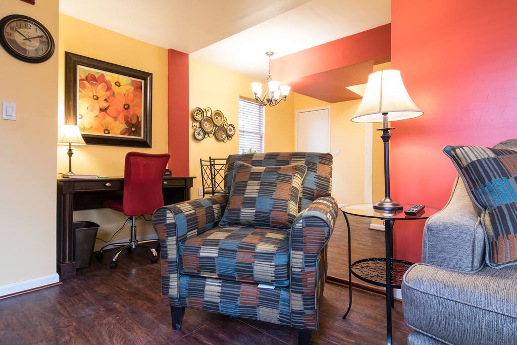 Living Room showing desk and way to Dinning Area.