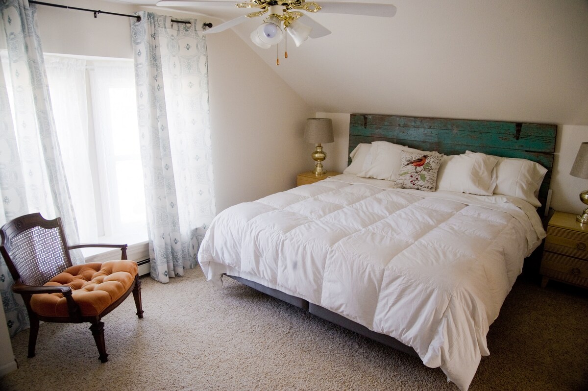 Bedroom 3 -- Upstairs, includes king bed, large dresser, walk-in closet and bay window