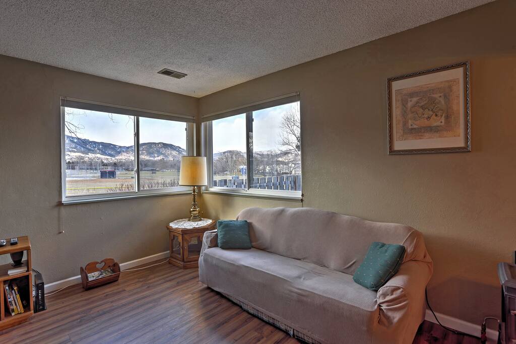 Unwind on the cozy living room couch and read a good book.