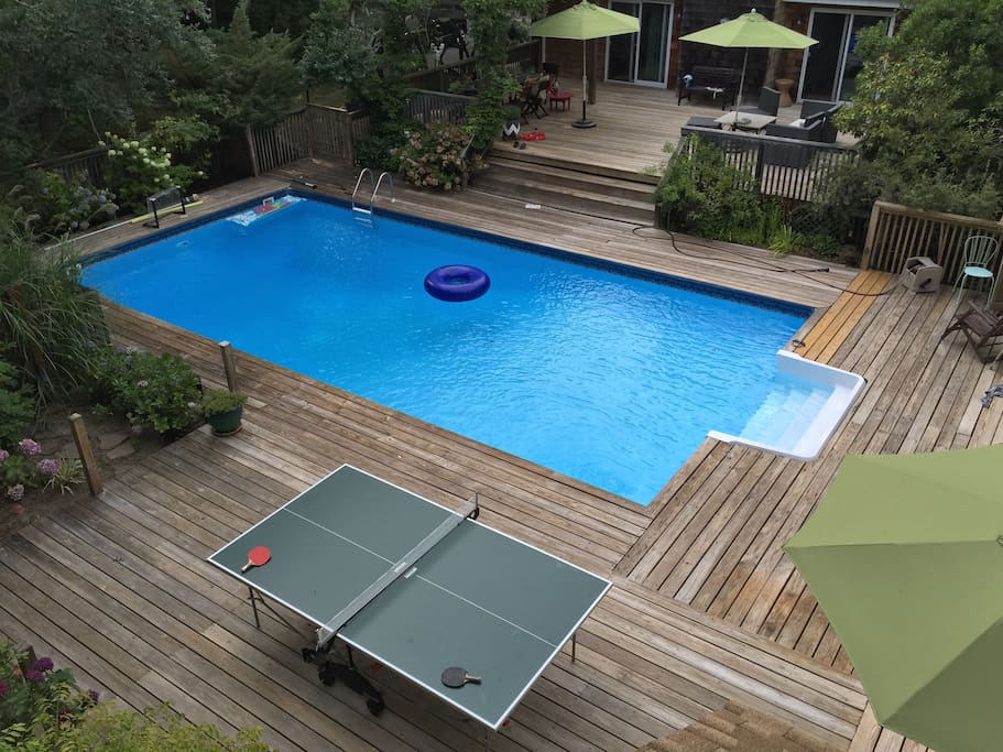 2 decks with pool and outdoor shower, outdoor dining room and lounge, ping pong table, basketball hoop