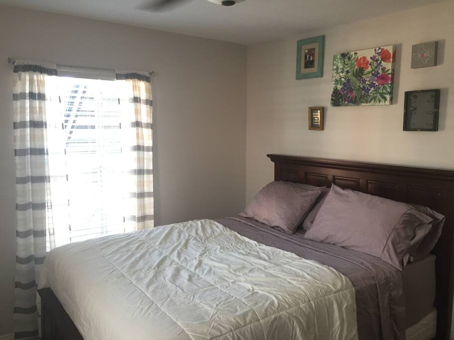 Bedroom with queen sized bed.