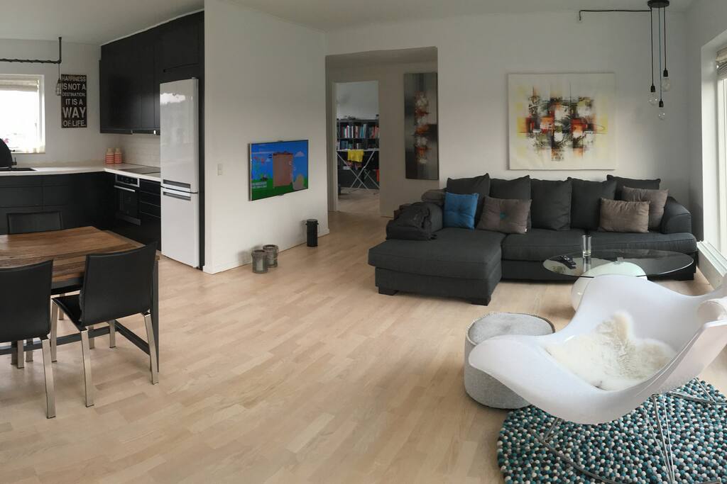 The living room and some of the kitchen