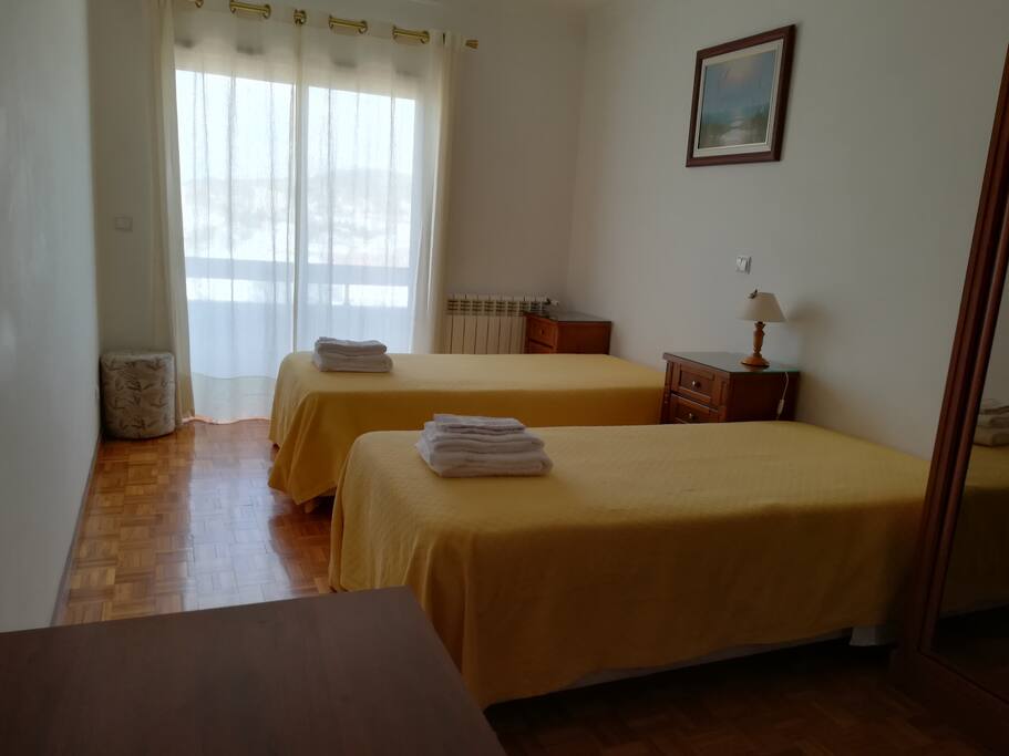 Bedroom with 2 single beds and private bathroom
