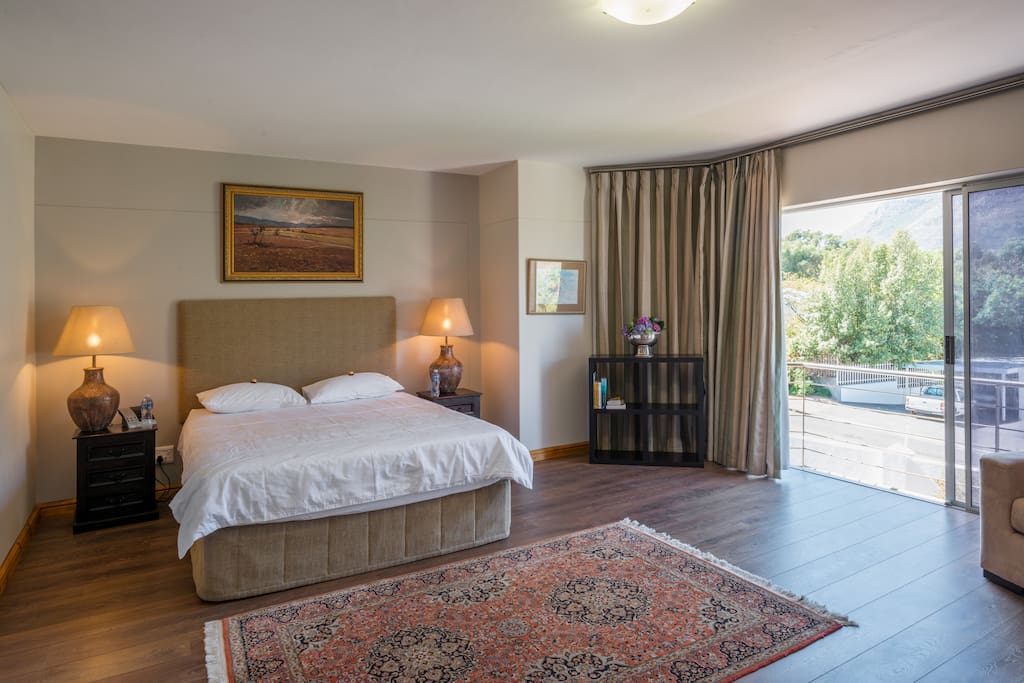 Spacious main en suite bedroom with breathtaking views of the Bay