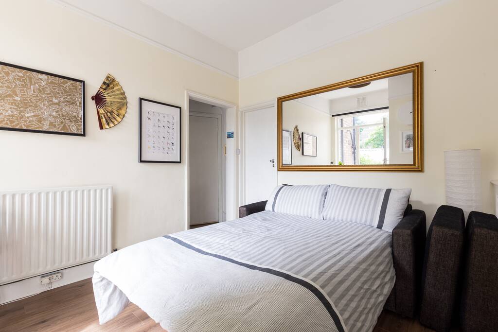 Small sofa bed, sleeps 2. Your bedding could potentially be different than the one in the photo because I have 2 sets.