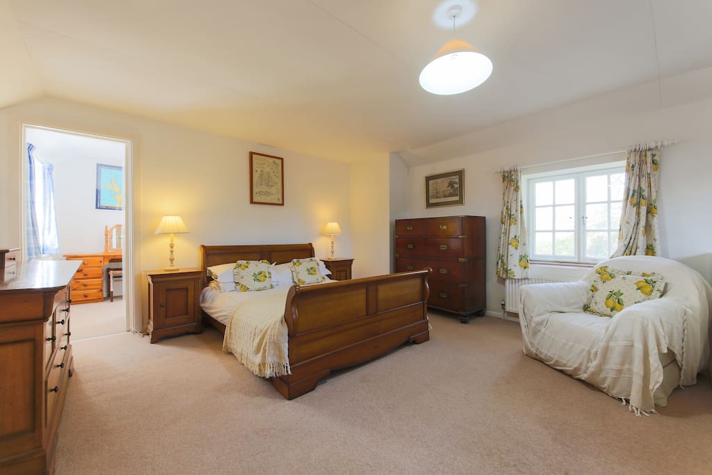 Bright master bedroom with twin room off it at Liitle Albion holiday cottage Bells Hill Mylor