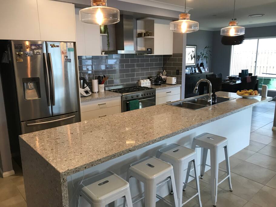 Shared kitchen amenities. Includes toaster, kettle, coffee machine , plates and cutlery.