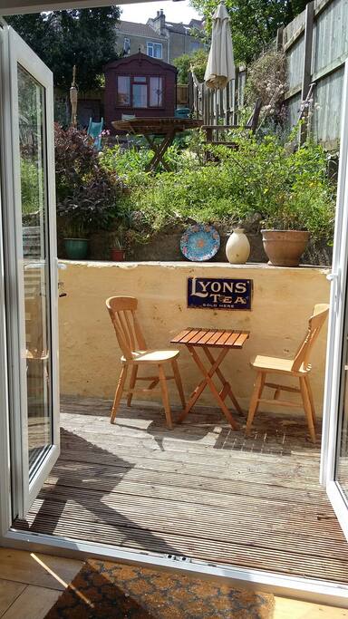 Rear patio leading up to garden