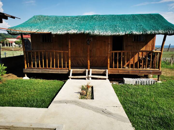 nipa hut with 2 rms  (one rm available with electric fan)