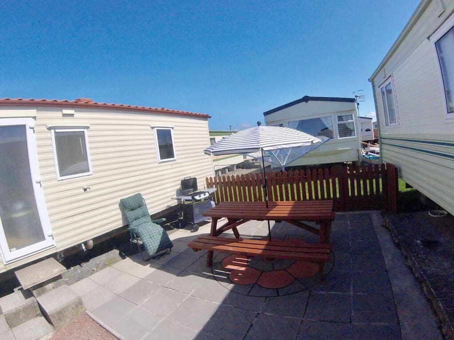 Patio with seating and BBQ