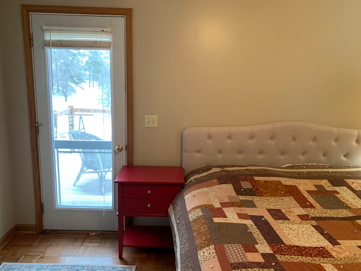 King bed with private entrance and private porch.