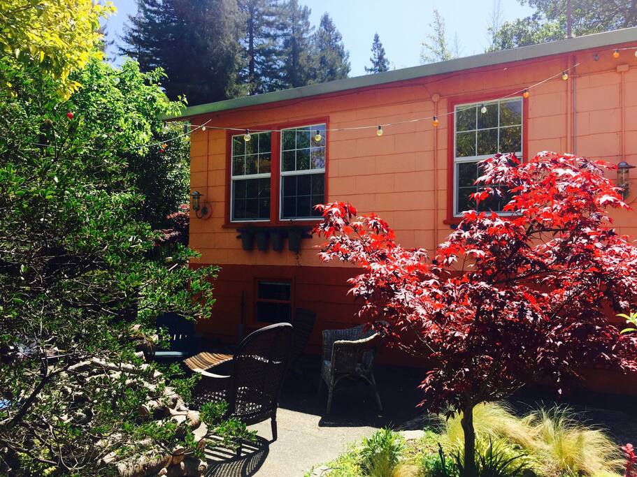 Patio between the two houses has a chimnea for fires, night lighting, table and seating for dining and lounging.
