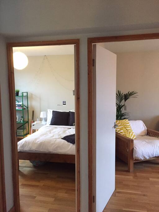 View into the room and living room from the hallway
