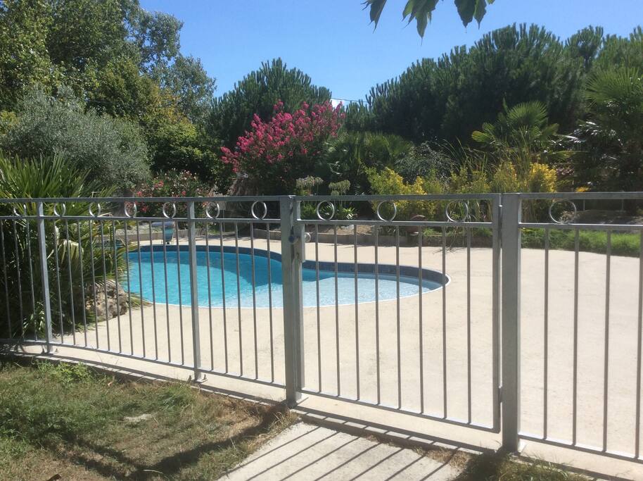 Piscine de 12X9m avec pataugeoire