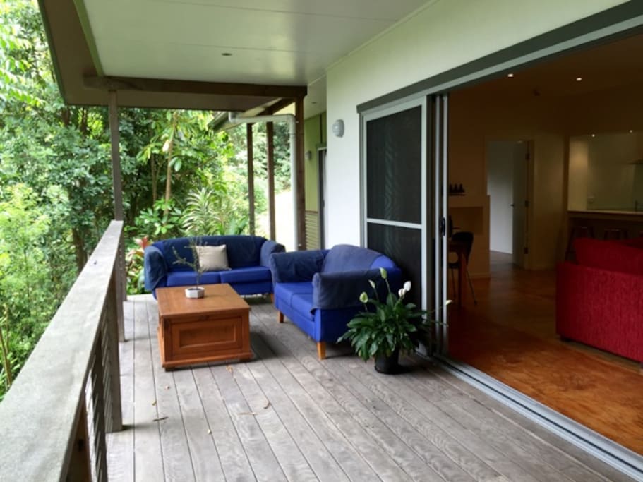 Relax on the private wrap around deck tucked away next to the nature reserve.
