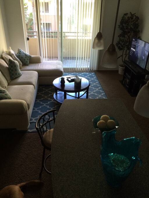 open living room w/ bar stools