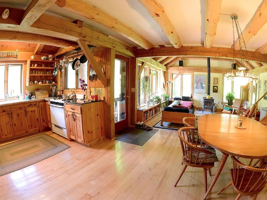 View of Kitchen/Dining Rooms and Living Room in background. Photo by John Finn.