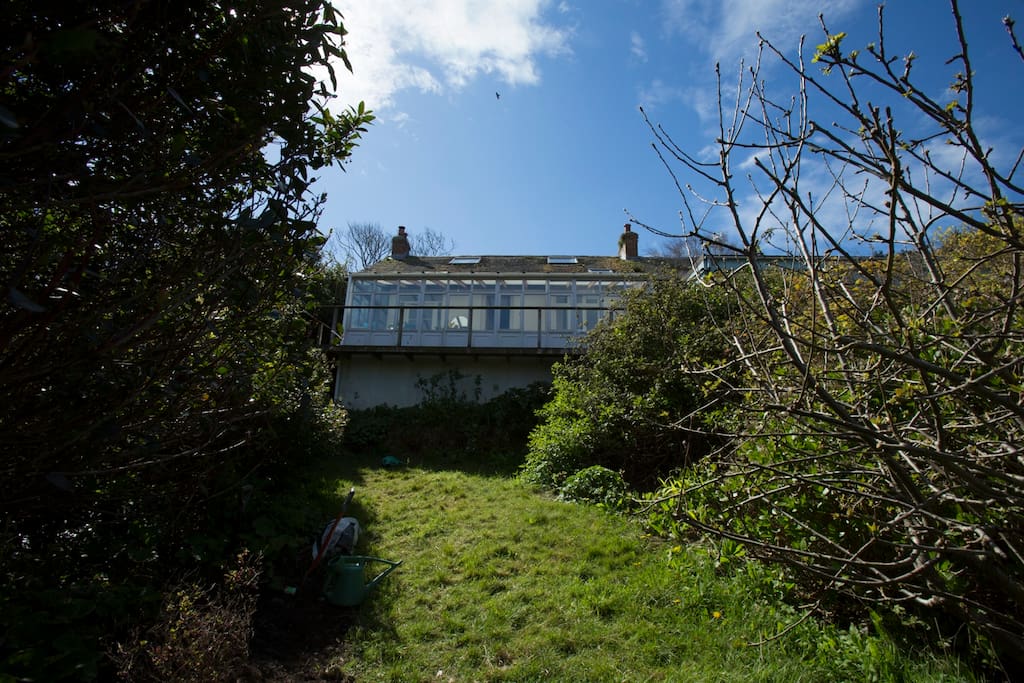 A 1927 bungalow with high ceilings and a wrap around balcony