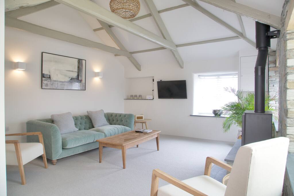 Lounge with smart TV, log burner and a very comfy sofa!