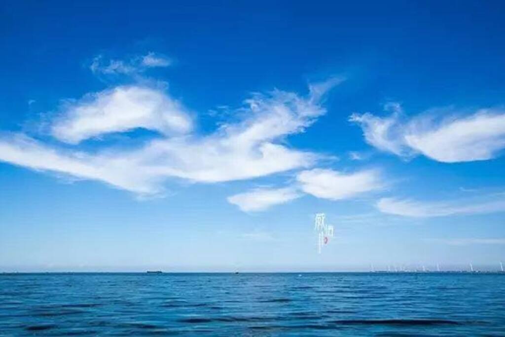 几抹浮云过海漂洋一窗美景赏心悦目