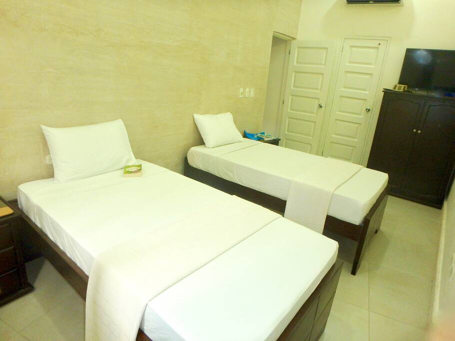 Twin beds (seen here) which can be made in to a king, TV, & en suite full bath