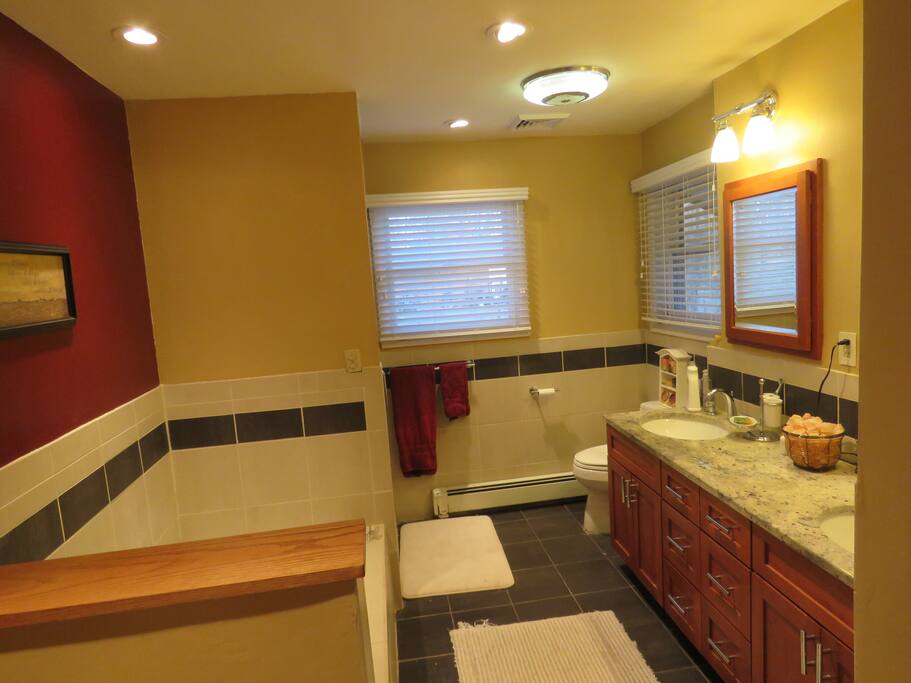Bathroom features a separate shower and bathtub.