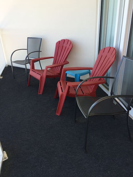 Private balcony with comfortable chairs