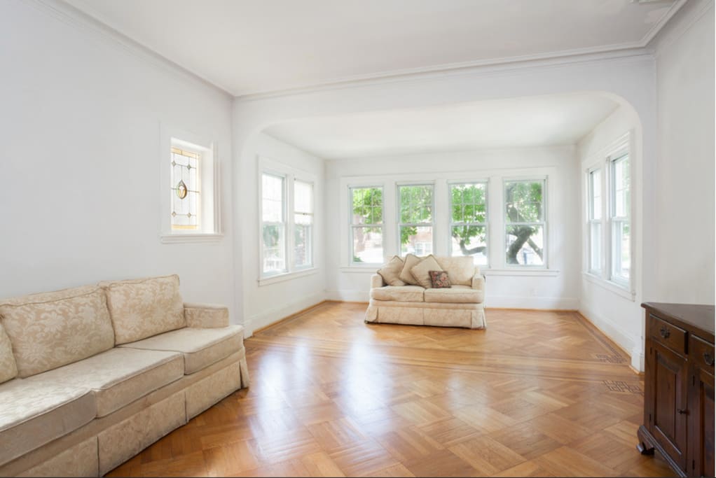 Now with pale tan walls and newer couches