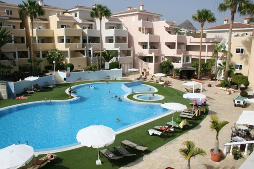 Pool showing round jacuzzi and kids paddling pool