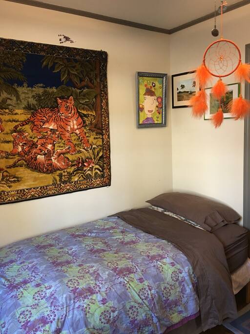 New mattress, single bed, full of toy collections.