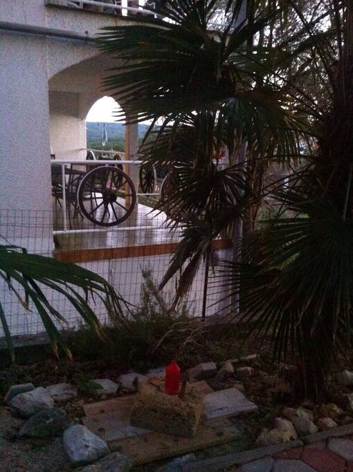 View of the balcony from the yard