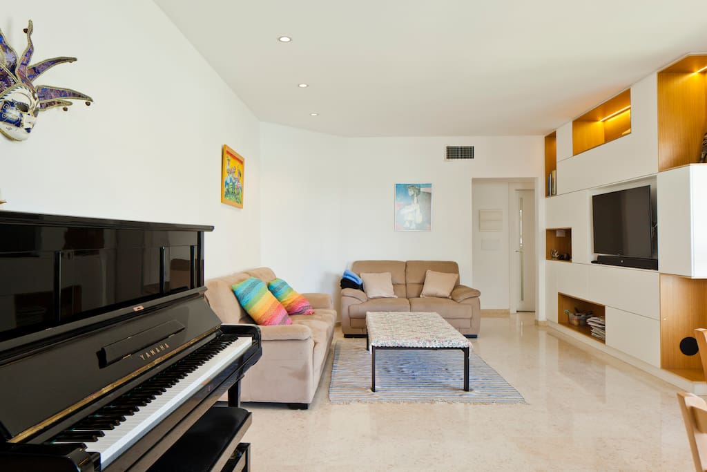 Spacious living room. Includes two sofas (3+2 seats), table, 48'' HD smart TV.