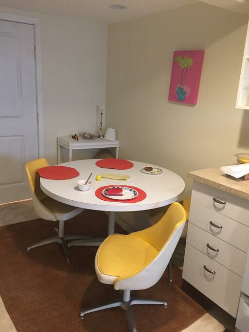 Dining Area by the kitchen. The door you see is the entrance to the suite.