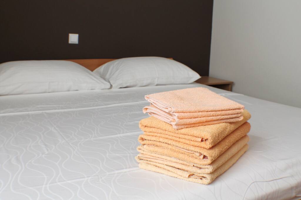 Master bedroom with double bed and plenty of storage space.
