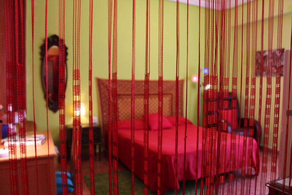 Cozy, huge room with massage sofa, 42" plasma TV and DVD collection.
