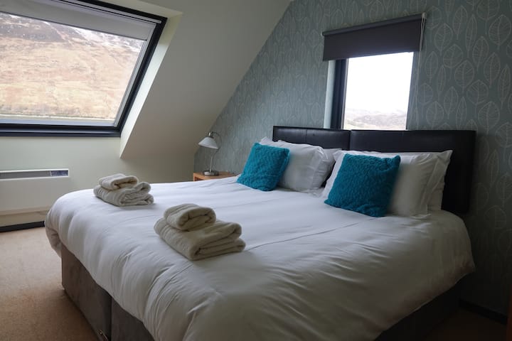 The other first floor bedroom, with great loch and mountain views.  Can either have a superking or 2 single beds.