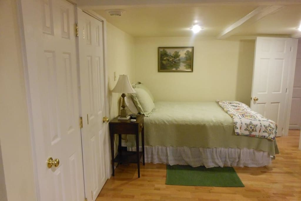 Cozy queen bed room.